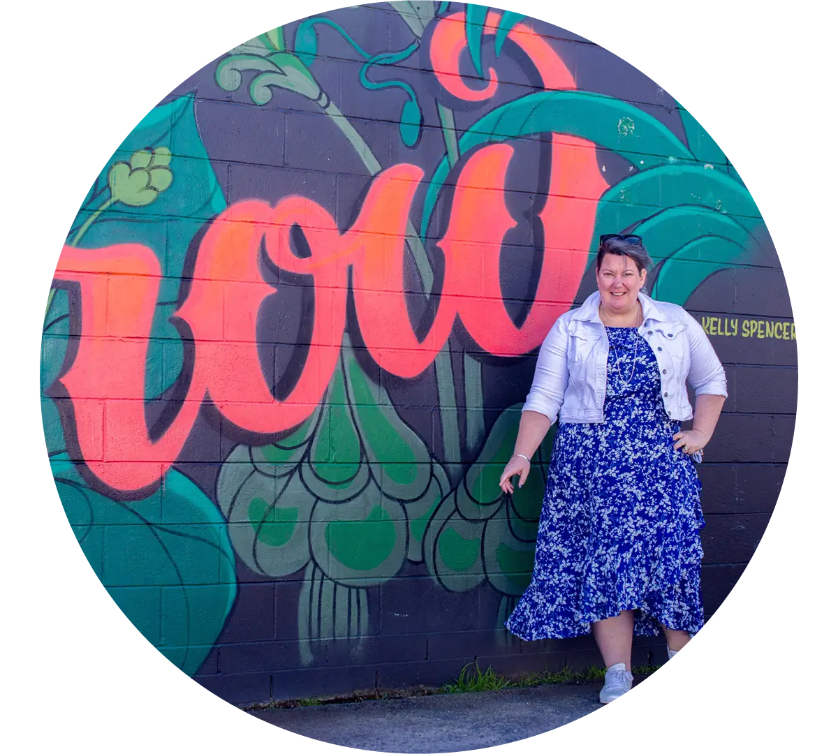 Pauline Stockhausen standing next to graffiti